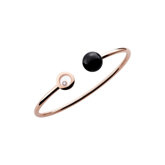 Chopard Happy Diamonds bangle in 18k ethical rose gold with diamonds and onyx