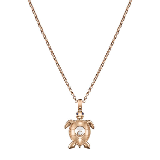 Chopard Happy Diamonds pendant in 18k ethical rose gold with moving diamonds and sapphires