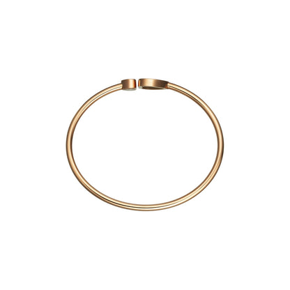 Chopard Happy Hearts bangle in 18k ethical rose gold with diamonds and onyx view 3
