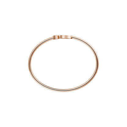 Chopard Happy Hearts bangle in 18k ethical rose gold with diamonds and mother of pearl view 3