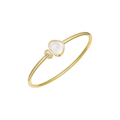 Chopard Happy Hearts bangle in 18k ethical yellow gold with diamonds and mother of pearl view 2