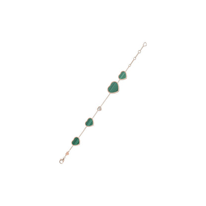 Chopard Happy Hearts bracelet in 18k ethical rose gold with moving diamonds and malachite view 2
