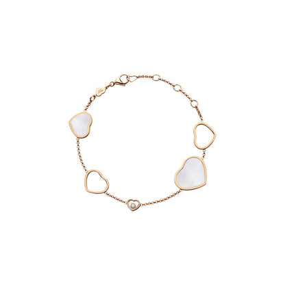 Chopard Happy Hearts bracelet in 18k ethical rose gold with moving diamonds and mother of pearl
