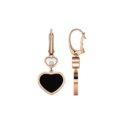 Chopard Happy Hearts earrings in 18k ethical rose gold with moving diamonds and onyx view 2