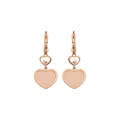 Chopard Happy Hearts earrings in 18k ethical rose gold with moving diamonds view 4