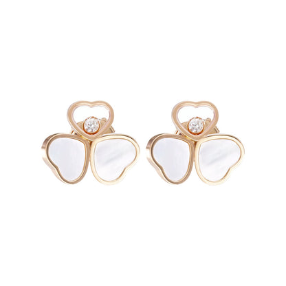 Chopard Happy Hearts earrings in 18k ethical rose gold with moving diamonds and mother of pearl view 3