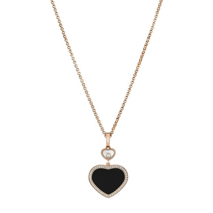 Chopard Happy Hearts pendant in 18k ethical rose gold with moving diamonds and onyx