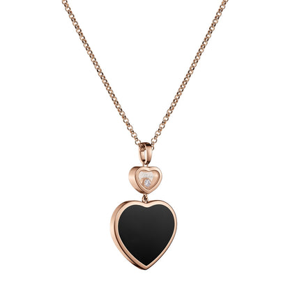 Chopard Happy Hearts pendant in 18k ethical rose gold with moving diamonds and onyx, view 2