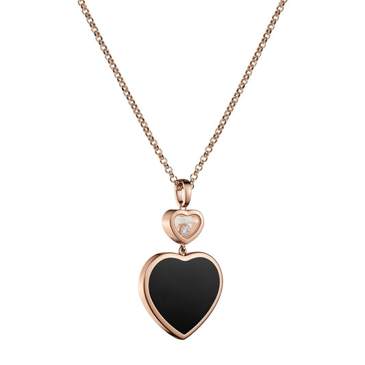 Chopard Happy Hearts pendant in 18k ethical rose gold with moving diamonds and onyx, view 2